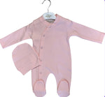 pink buttoned babygrow and hat