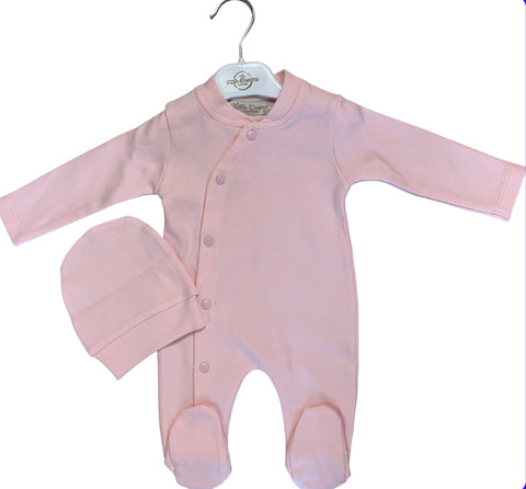 pink buttoned babygrow and hat